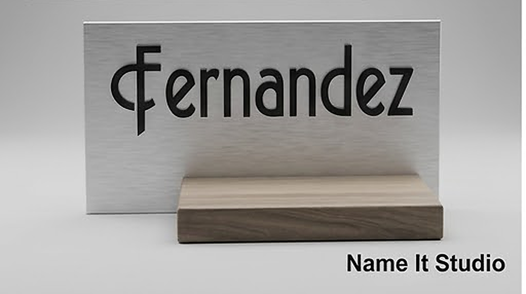 Fernandez Aluminium: Brushed aluminium-style nameplate with crisp dark lettering.