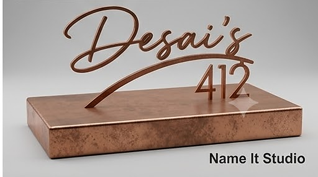 Desai Copper: Aged copper-style script nameplate with a graceful house number.