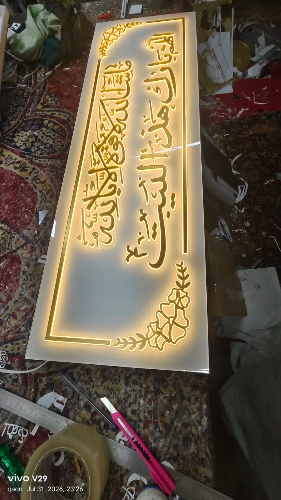 Original photograph of a round acrylic nameplate