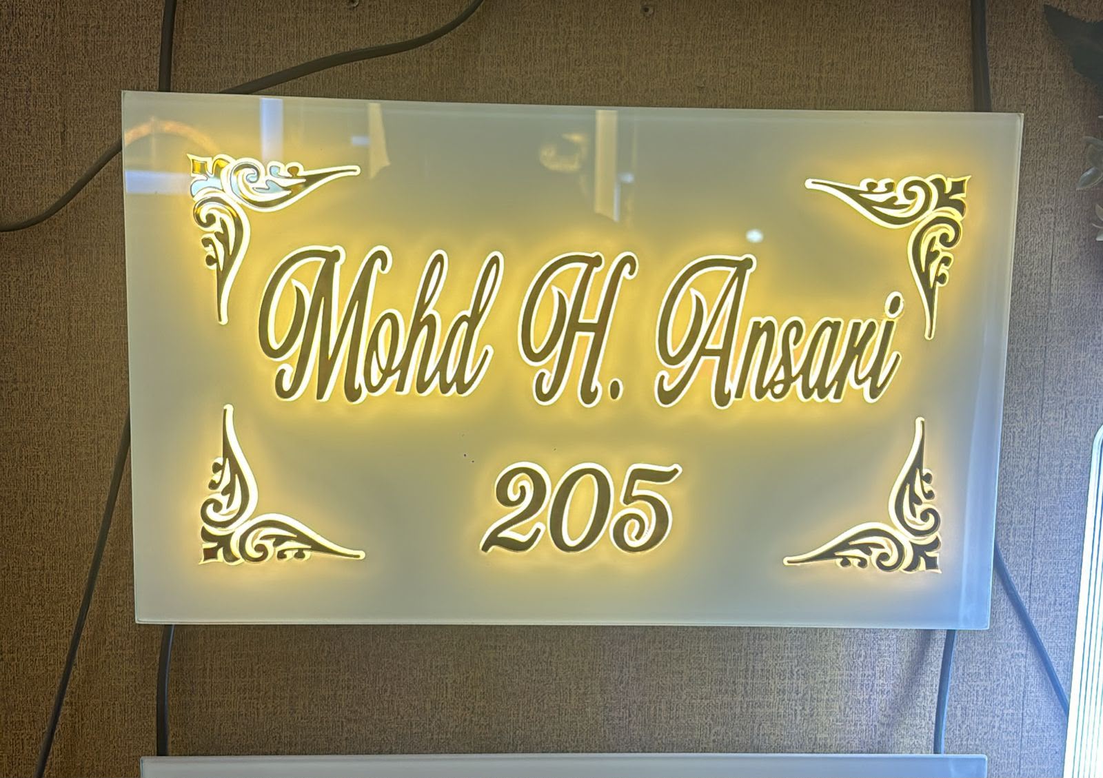 Original photograph of a custom illuminated nameplate